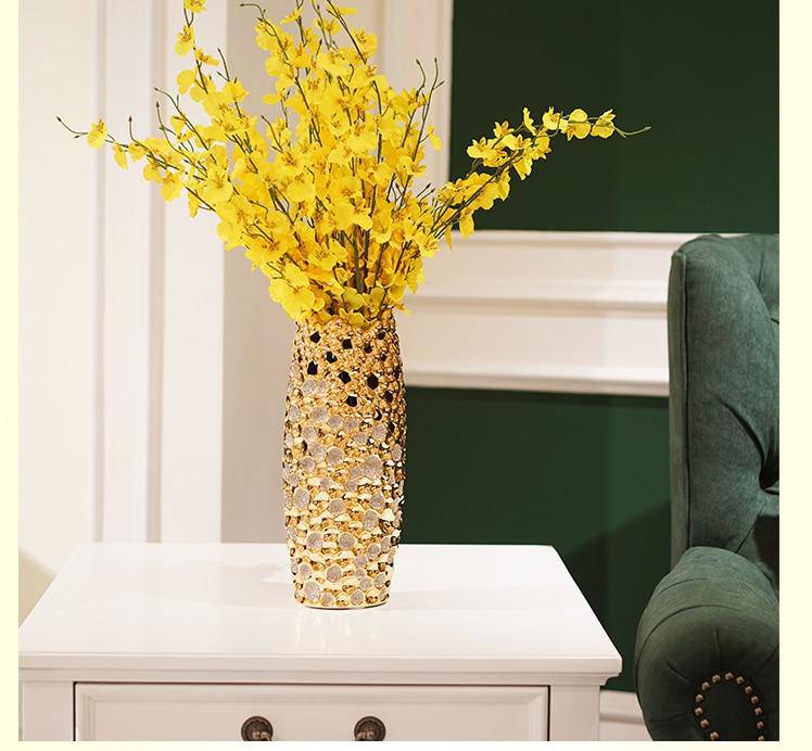 Vase design long en céramique dorée festival